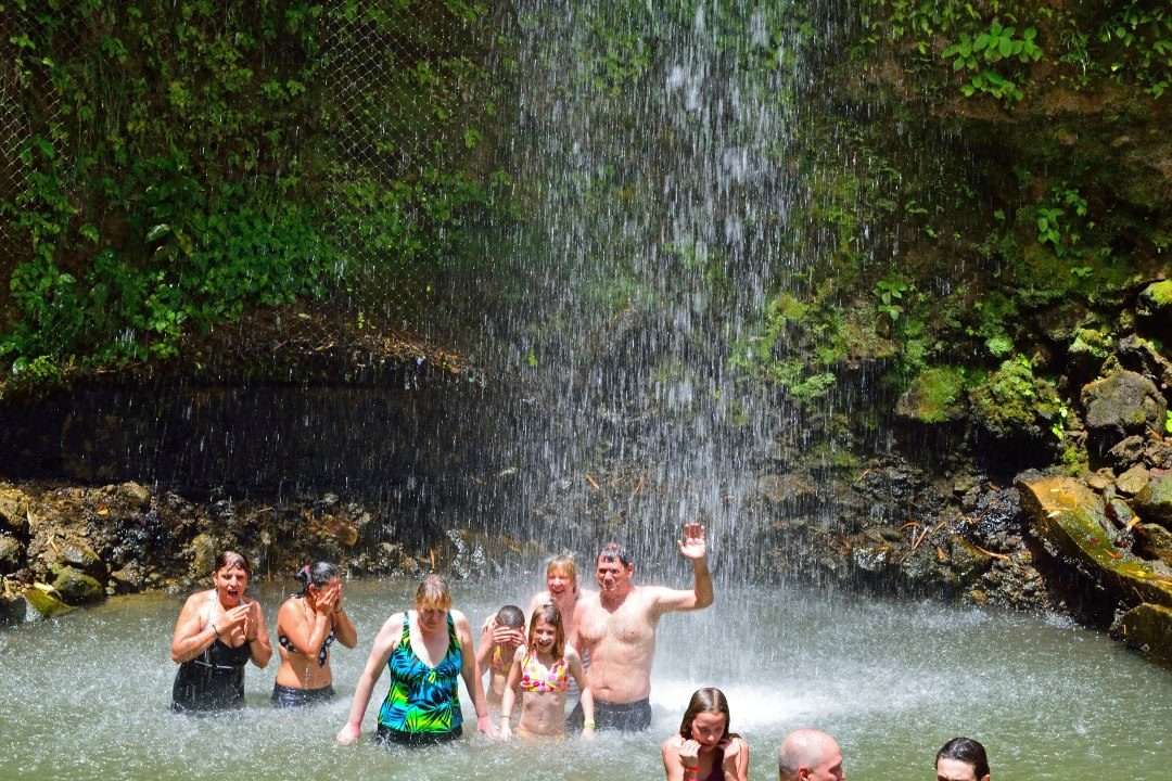 Guests at a Saint Lucia waterfall